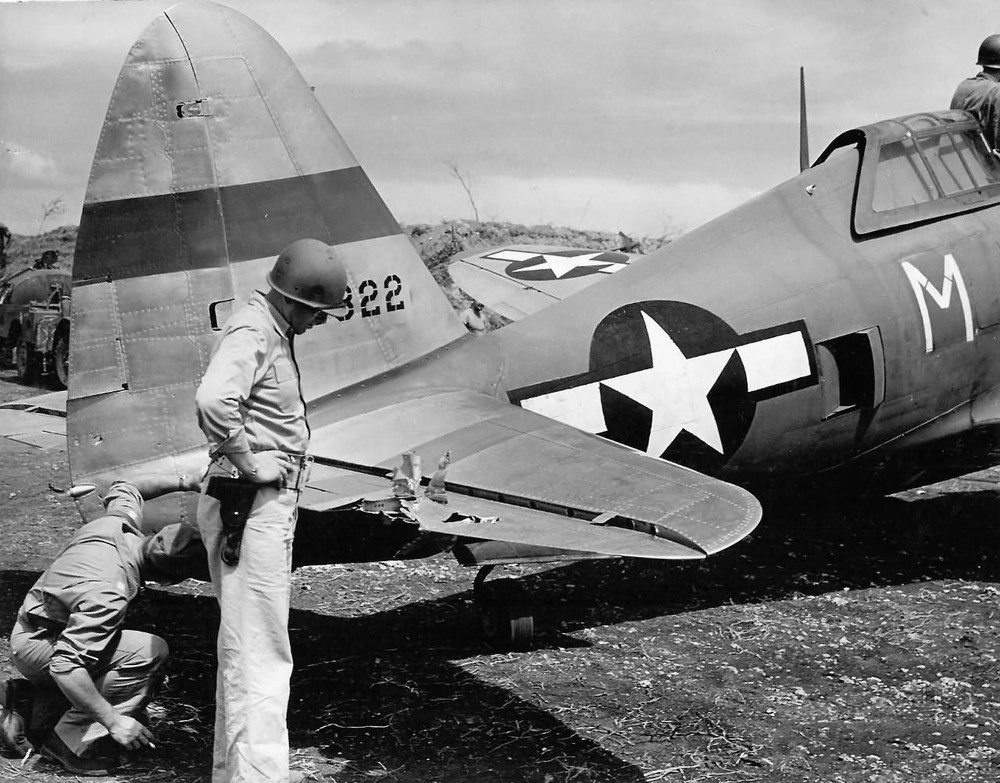 Damaged_P-47_318th_FG_19th_FS.thumb.jpg.f1fa2155eda3982a4f3eabdf1c55aa1e.jpg