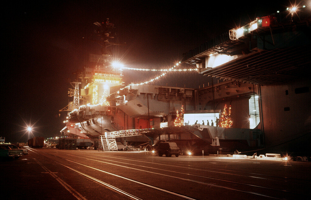 christmas-lights-illuminate-the-aircraft-carrier-uss-america-cv-66-while-the-d40b7f.jpg